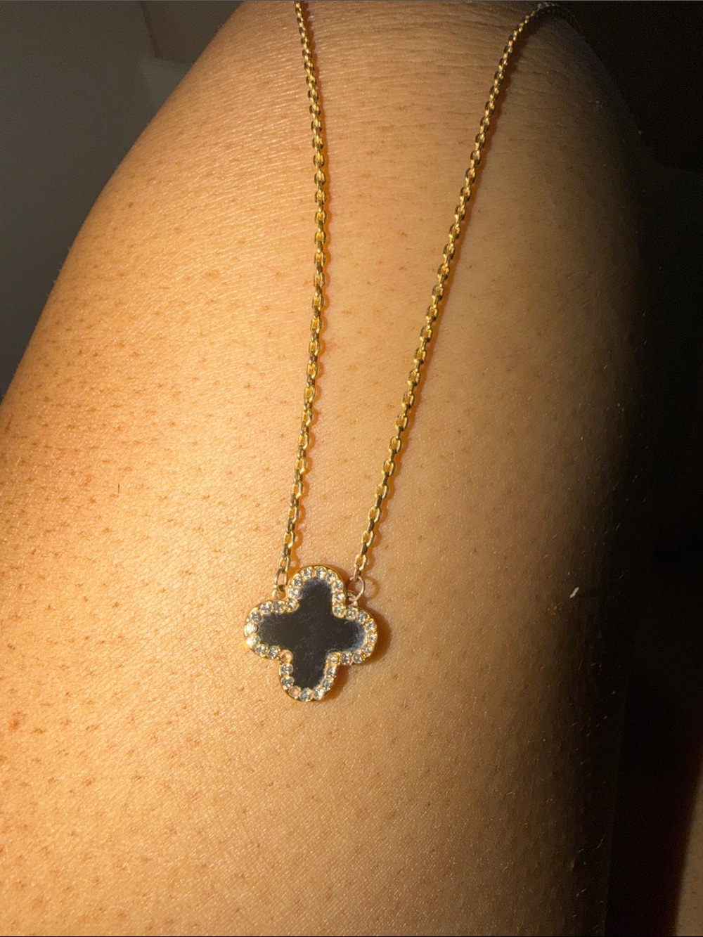 Gold-Tone Necklace with Black Clover Pendant and Crystal Trim